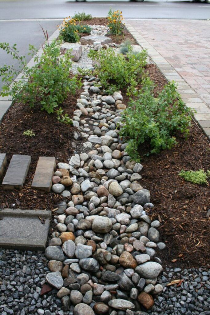 tiny_site_home_hardscaping_rain garden_bluerock